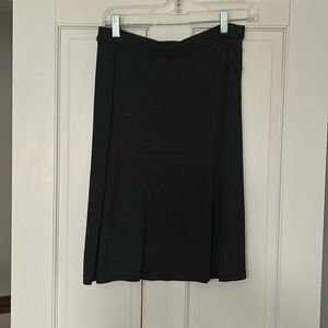 Gray skirt, falls just below the knee, perfect condition